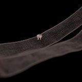 LUME's stella studs on a black background