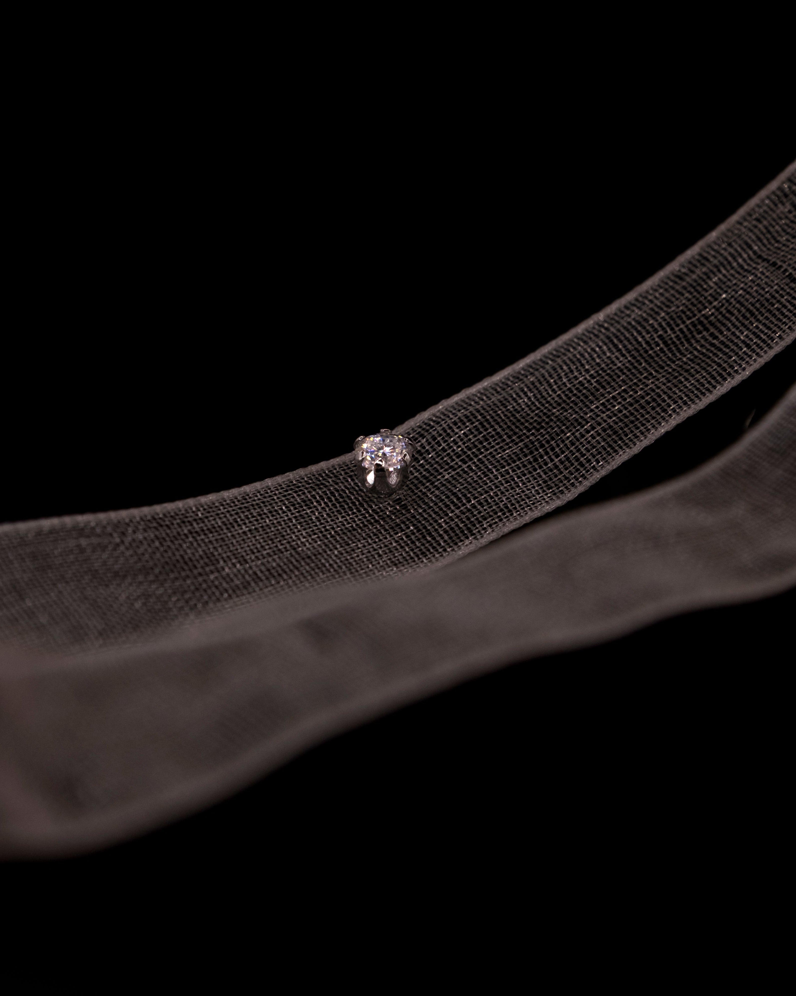 LUME's stella studs on a black background