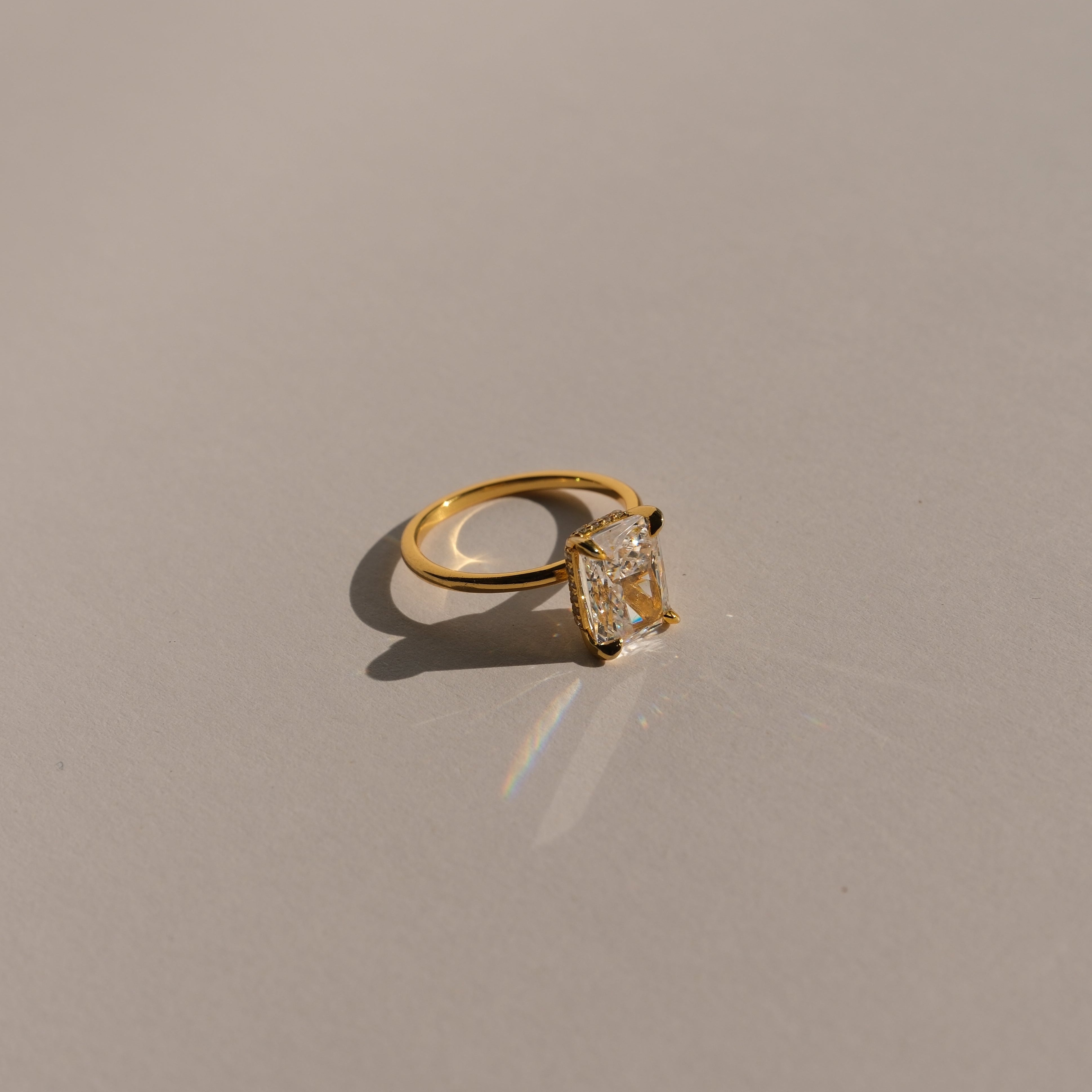 lume jewellery's elodie ring on a beige background