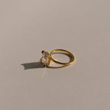 lume jewellery's elodie ring on a beige background