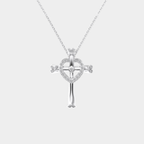 Silver cross necklace with heart design on a white background